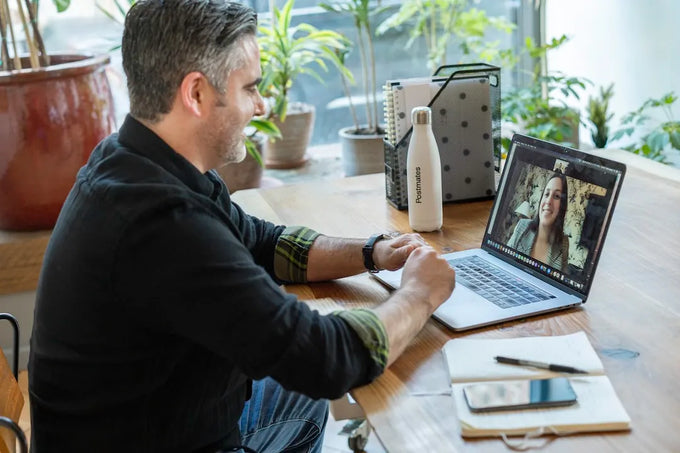 Patient learning what are the benefits of telehealth via video chat on laptop